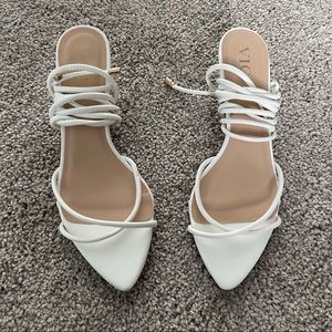 Vici. White kitten heel.